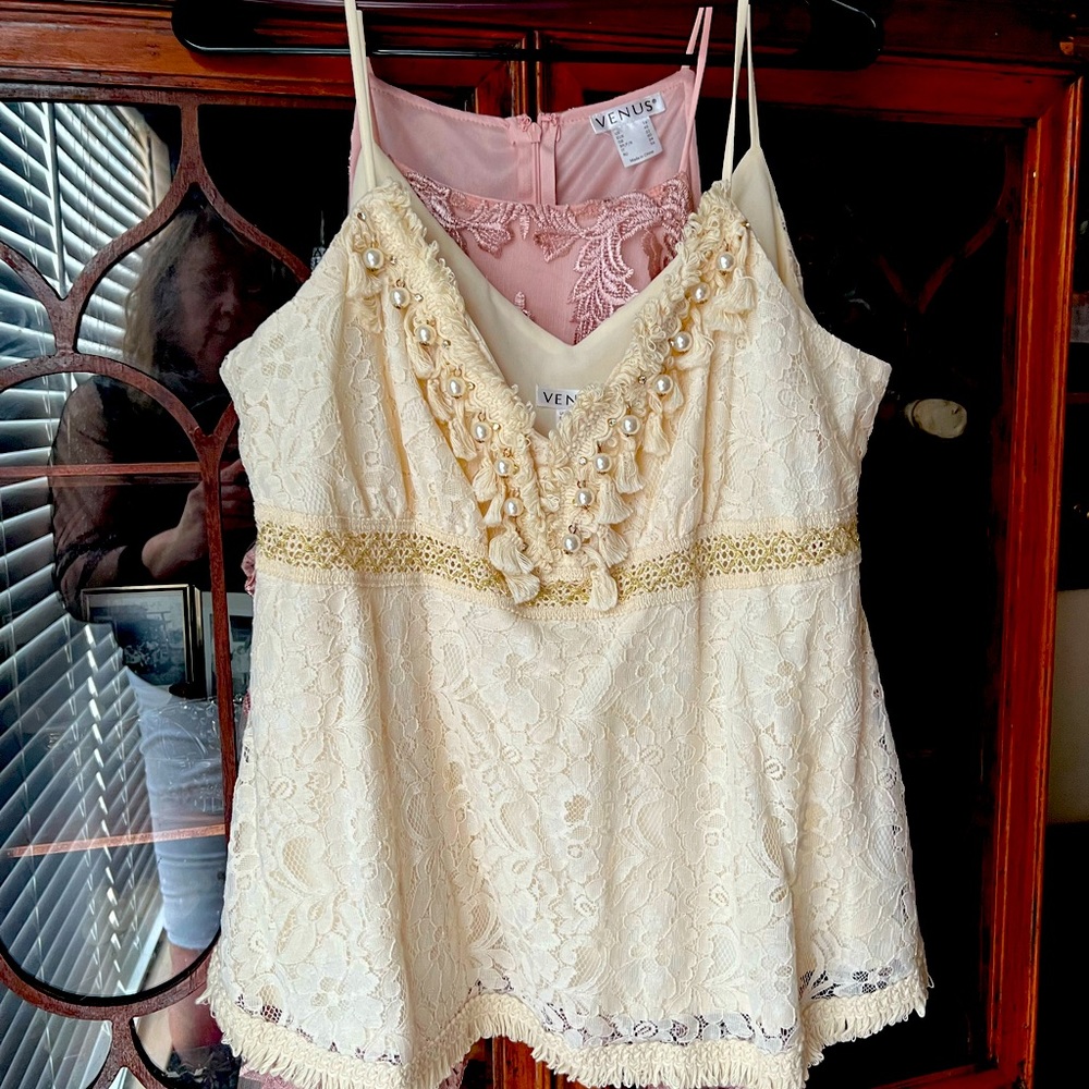 Beautiful cami with lace details. Looks great with a blazer over it.